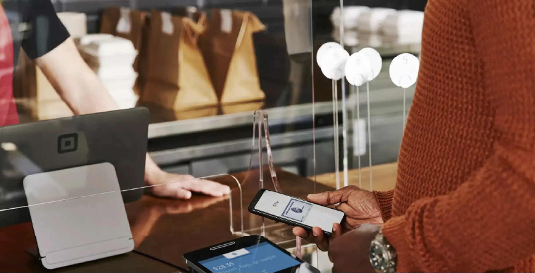 event staff taking a contactless payment on a POS bundle